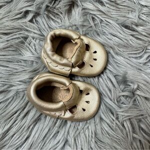 Gold scalloped moccasins